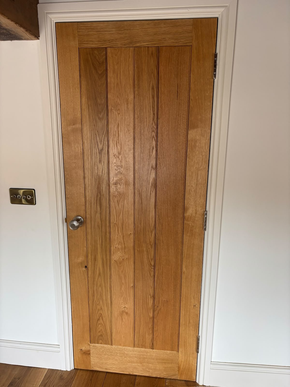 Solid oak internal door with white painted frame