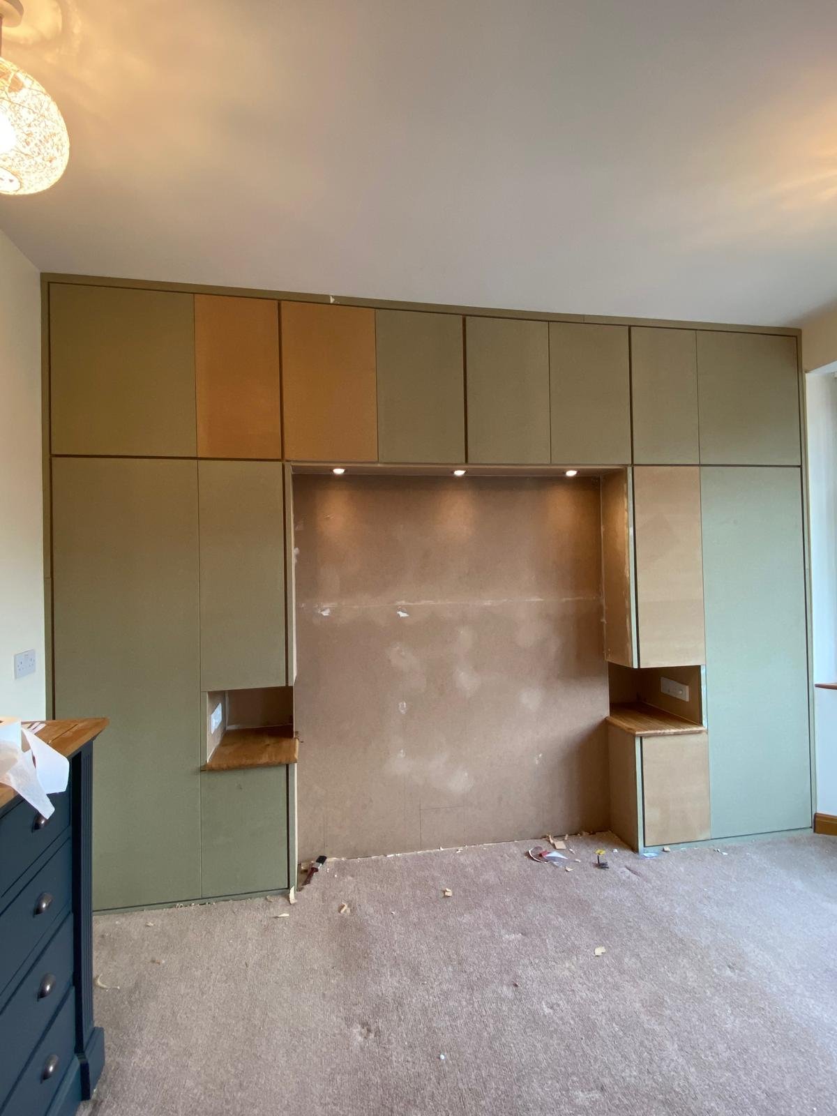 Sage green fitted wardrobes