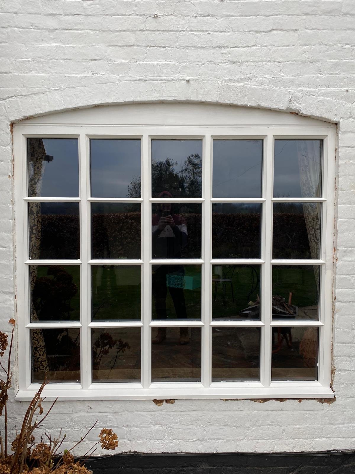 Multi-pane arched window